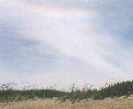 Sundog near top of image.